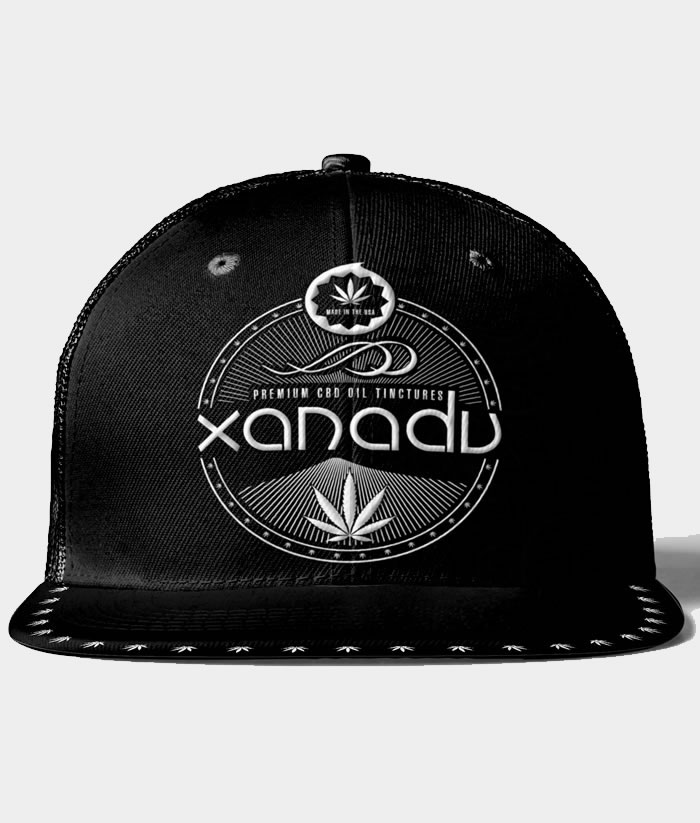 Xanadu 6 panel snap back trucker cap, white on black - front